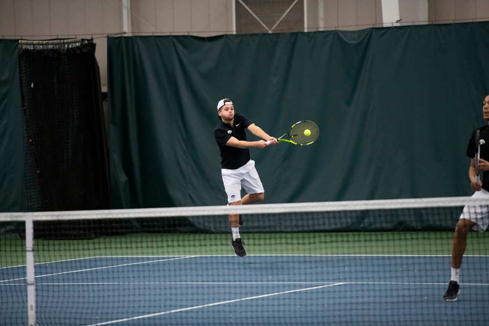 The Iowa men's tennis team competes against Cornell in The Rise Tennis Center in Ithaca, NY on Sunday, Feb. 24, 2019.
