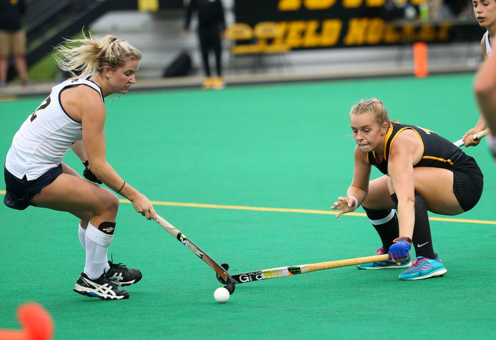 Iowa Hawkeyes midfielder Katie Birch (11) defends during a game against Michigan at Grant Field on October 5, 2018. (Tork Mason/hawkeyesports.com)