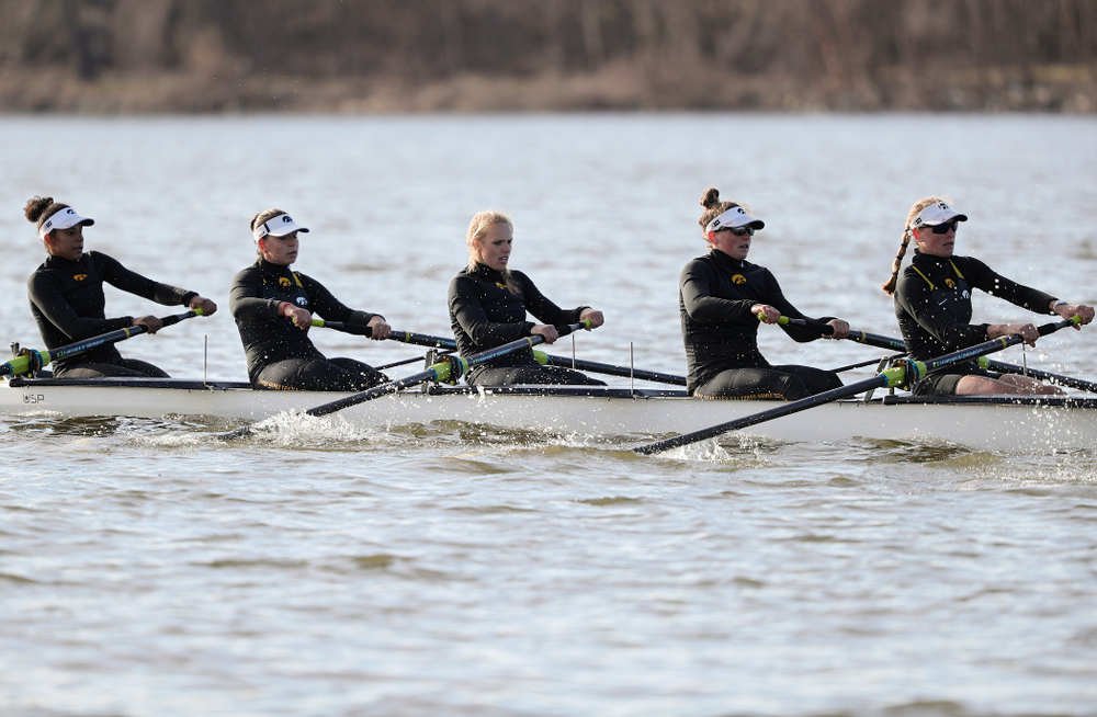 Iowa's Naomi Visser (from left), Elena Waiglein, Paige Schlapkohl, Hannah Greenlee, and Hunter Koenigsfeld during their I Varsity 8 race against Minnesota in their Big Ten Double Dual Rowing Regatta at Lake Macbride in Solon on Saturday, Apr. 13, 2019. (Stephen Mally/hawkeyesports.com)