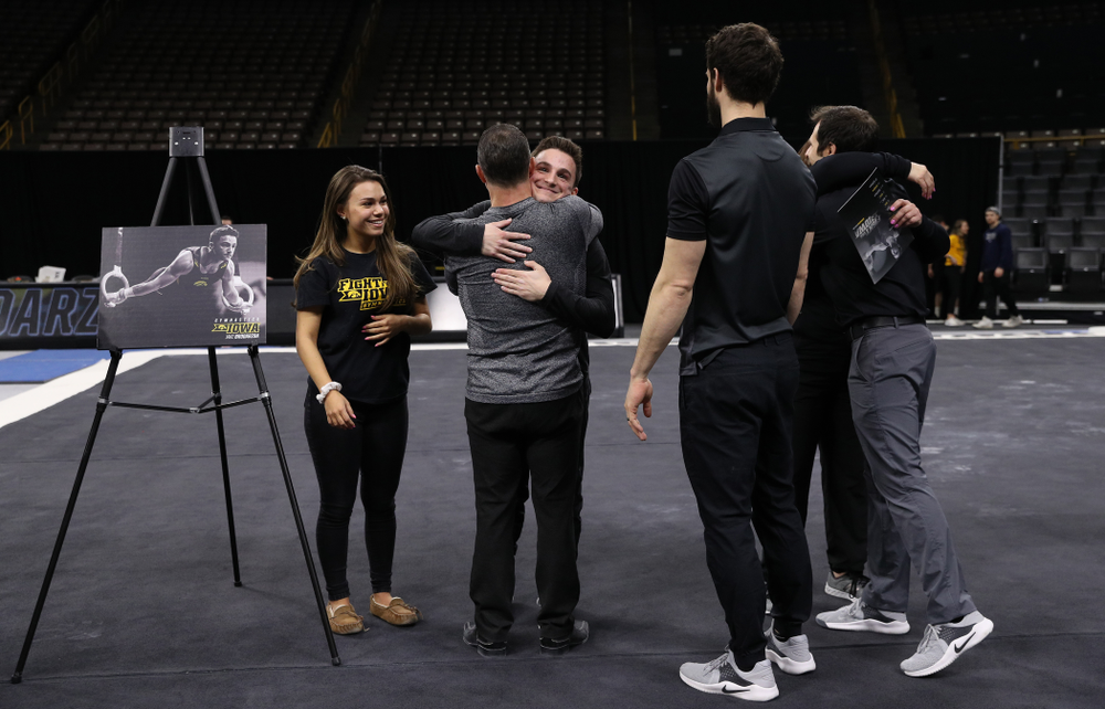Iowa Men's Gymnast Jake Brodarzon and his family during senior day ceremonies following their meet against the Ohio State Buckeyes Saturday, March 16, 2019 at Carver-Hawkeye Arena. (Brian Ray/hawkeyesports.com)