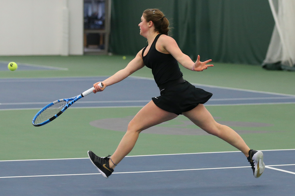 Iowa’s Erika Dodridge returns a hit during the Iowa women’s tennis meet vs UNI on Saturday, February 29, 2020 at the Hawkeye Tennis and Recreation Complex. (Lily Smith/hawkeyesports.com)