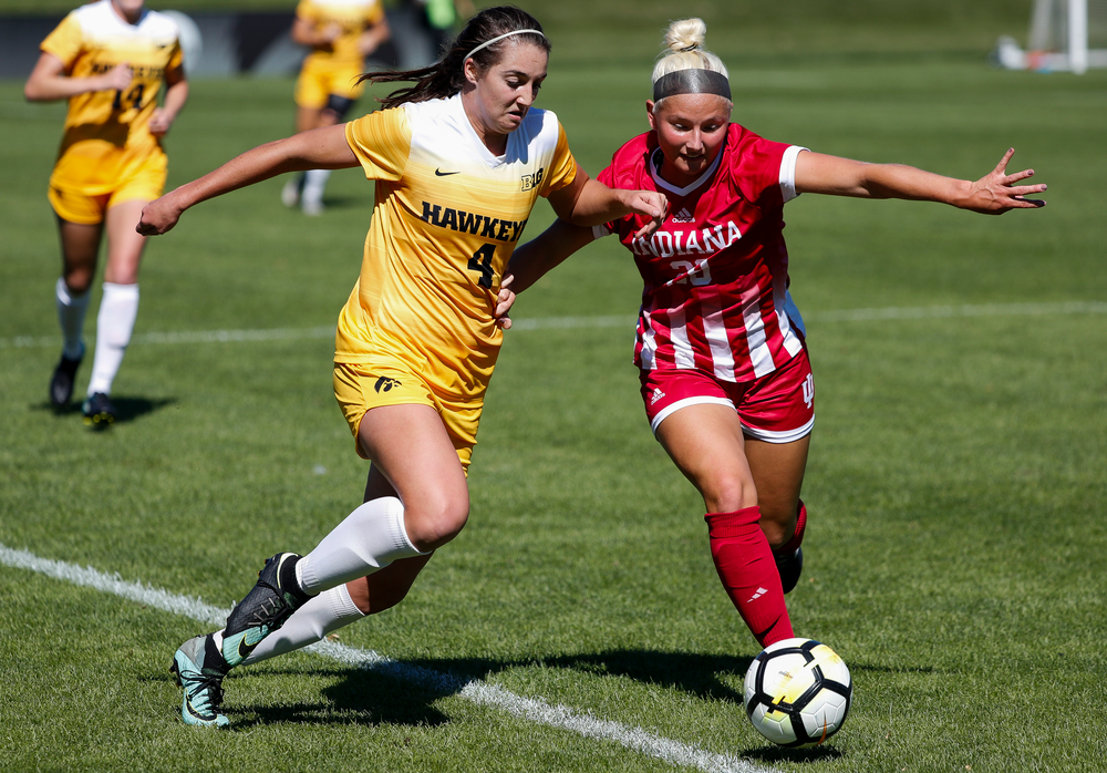 Iowa Hawkeyes forward Kaleigh Haus (4) battles for possession during a game against Indiana at the Iowa Soccer Complex on September 23, 2018. (Tork Mason/hawkeyesports.com)
