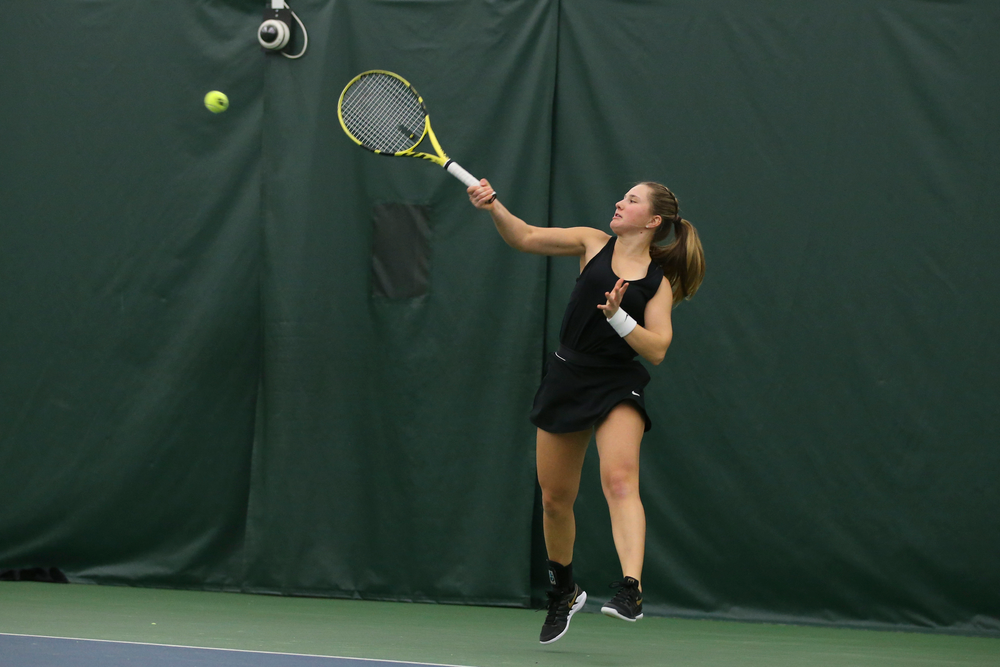 Iowa’s Danielle Burich returns a ball during the Iowa women’s tennis meet vs UNI on Saturday, February 29, 2020 at the Hawkeye Tennis and Recreation Complex. (Lily Smith/hawkeyesports.com)