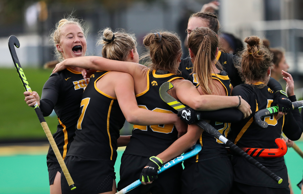 Members of the Iowa Hawkeyes field hockey team celebrate after a goal scored by Iowa Hawkeyes forward Madeleine Murphy (26) during a game against No. 6 Penn State at Grant Field on October 12, 2018. (Tork Mason/hawkeyesports.com)