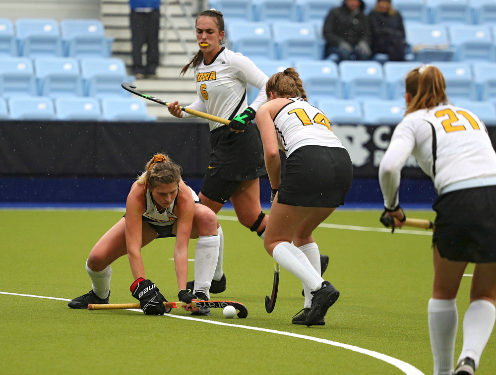 Iowa’s Ellie Holley (7) positions the ball for Lokke Stribos (14) on a penalty corner during the second quarter of their NCAA Tournament First Round match against Duke at Karen Shelton Stadium in Chapel Hill, N.C. on Friday, Nov 15, 2019. (Stephen Mally/hawkeyesports.com)