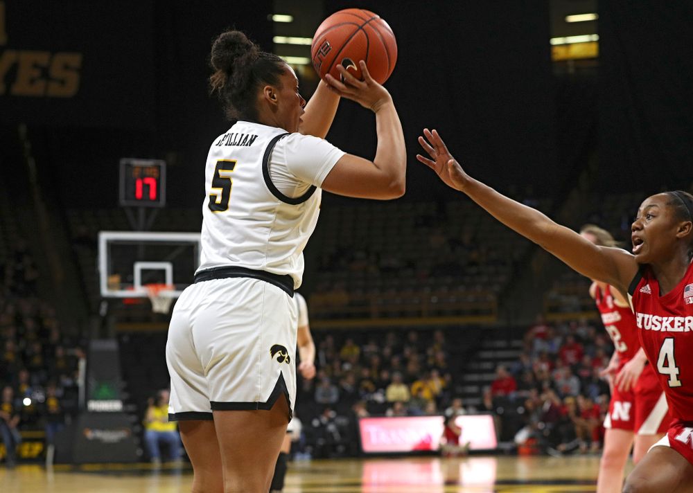 Iowa Hawkeyes guard Alexis Sevillian (5) makes a 3-pointer during the fourth quarter of the game at Carver-Hawkeye Arena in Iowa City on Thursday, February 6, 2020. (Stephen Mally/hawkeyesports.com)