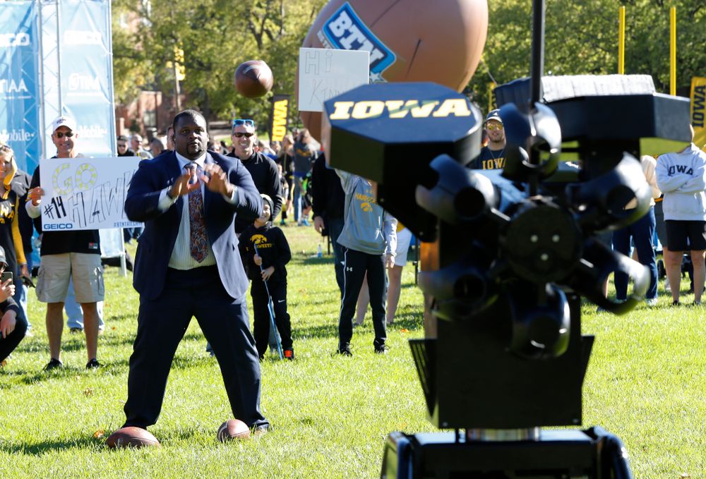 Spice Adams catches passes fro the Monarch Seeker robotic quarterback as the BTN Tailgate does a live show Saturday, September 22, 2018 at Hubbard Park on the University of Iowa Campus. (Brian Ray/hawkeyesports.com)