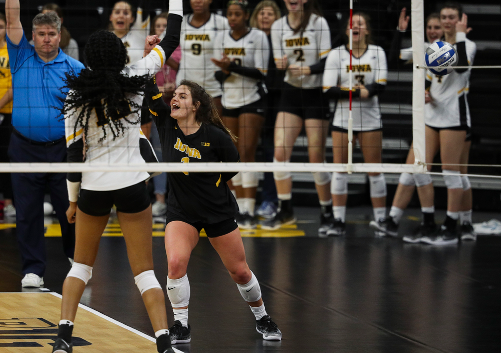 Iowa Hawkeyes defensive specialist Molly Kelly (1) celebrates after winning a point during a match against Maryland at Carver-Hawkeye Arena on November 23, 2018. (Tork Mason/hawkeyesports.com)