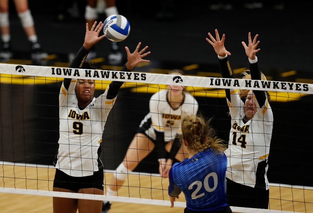Iowa Hawkeyes middle blocker Amiya Jones (9) and outside hitter Cali Hoye (14) against Eastern Illinois Sunday, September 9, 2018 at Carver-Hawkeye Arena. (Brian Ray/hawkeyesports.com)