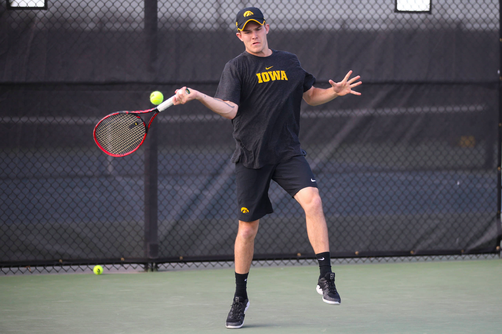 IowaÕs Jonas Larsen at tennis vs Illinois State on Sunday, April 21, 2019 at the Hawkeye Tennis and Recreation Complex. (Lily Smith/hawkeyesports.com)