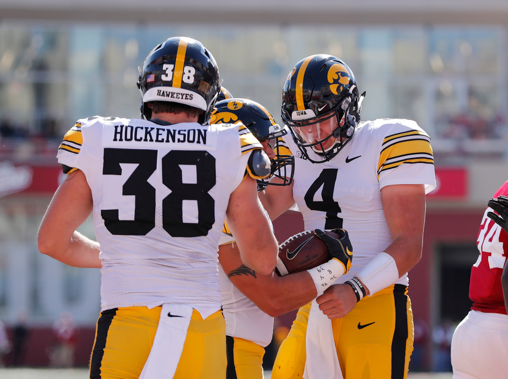 Iowa Hawkeyes fullback Austin Kelly celebrates with quarterback Nate Stanley (4) after scoring against the Indiana Hoosiers Saturday, October 13, 2018 at Memorial Stadium, in Bloomington, Ind. (Brian Ray/hawkeyesports.com)