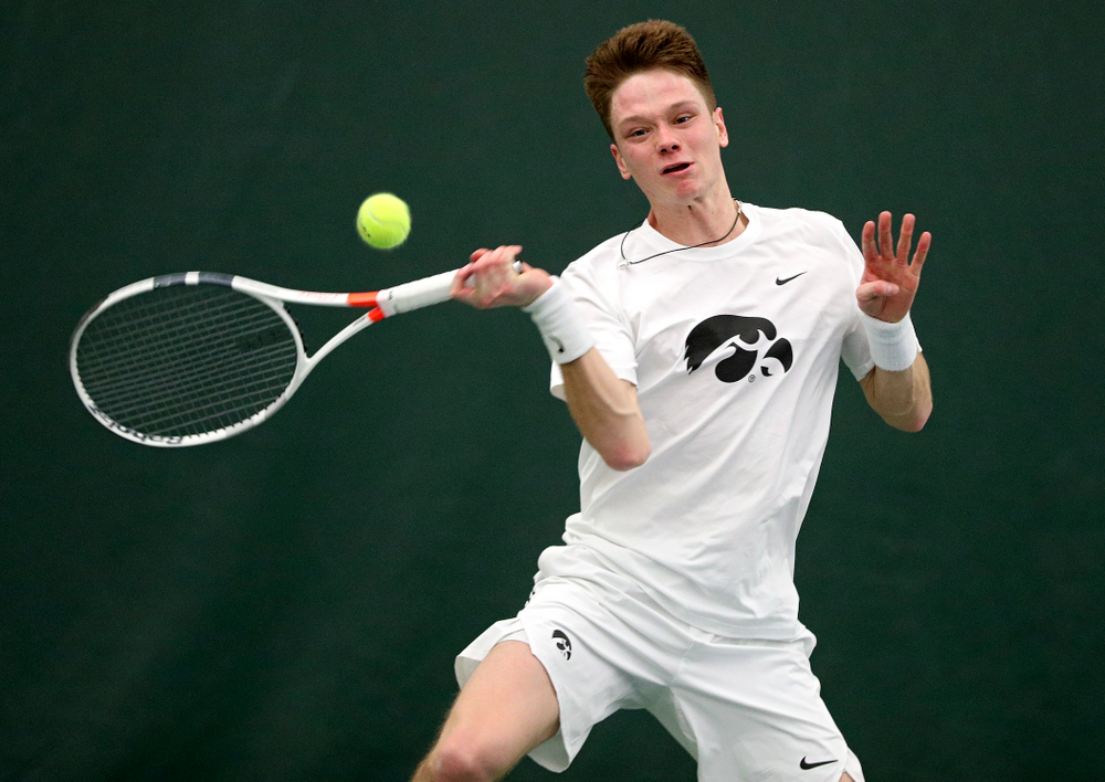 Iowa’s Jason Kerst returns a shot during his singles match at the Hawkeye Tennis and Recreation Complex in Iowa City on Sunday, February 16, 2020. (Stephen Mally/hawkeyesports.com)