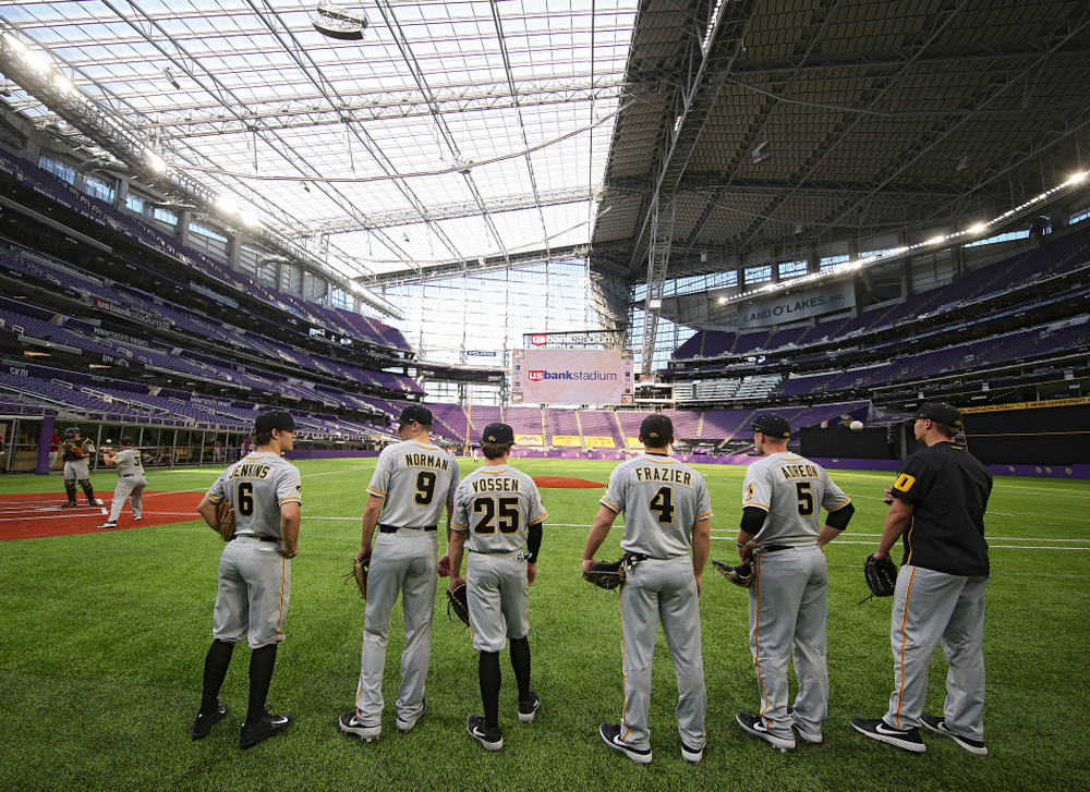 Iowa Hawkeyes outfielder Justin Jenkins (6), outfielder Ben Norman (9), outfielder Paul Vossen (25), infielder/catcher Brayden Frazier (4), outfielder/first baseman Zeb Adreon (5), and pitcher Jack Guzek (40) look on before their CambriaCollegeClassic game at U.S. Bank Stadium in Minneapolis, Minn. on Friday, February 28, 2020. (Stephen Mally/hawkeyesports.com)