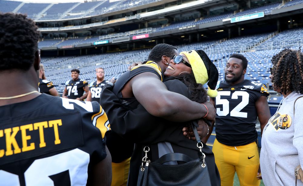 Iowa Hawkeyes defensive tackle Daviyon Nixon (54) following the team photo Wednesday, December 25, 2019 at SDCCU Stadium in San Diego. (Brian Ray/hawkeyesports.com)