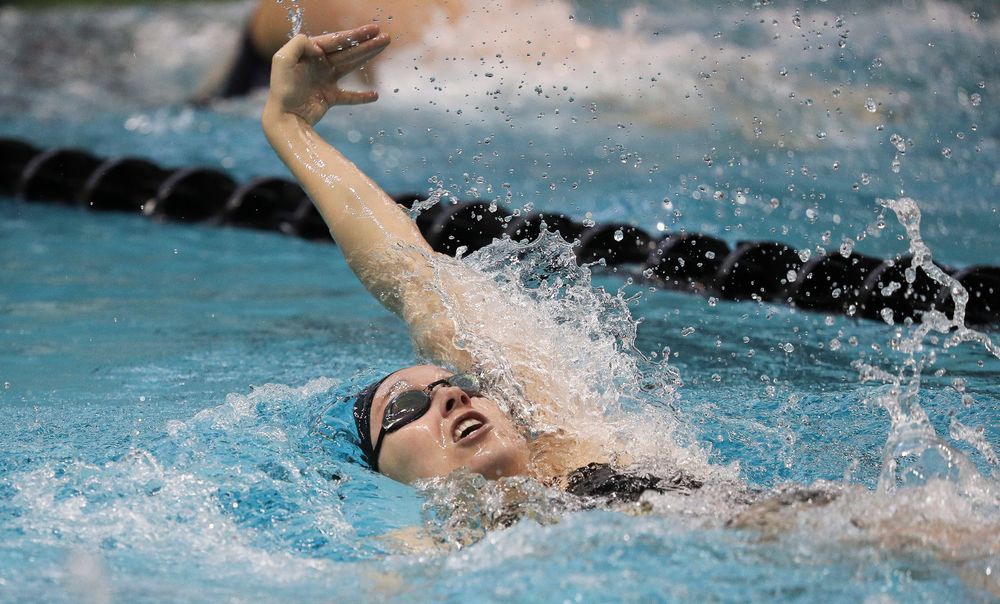 Iowa's Samantha Sauer competes in the 400-yard medley relay during a meet against Michigan and Denver at the Campus Recreation and Wellness Center on November 3, 2018. (Tork Mason/hawkeyesports.com)