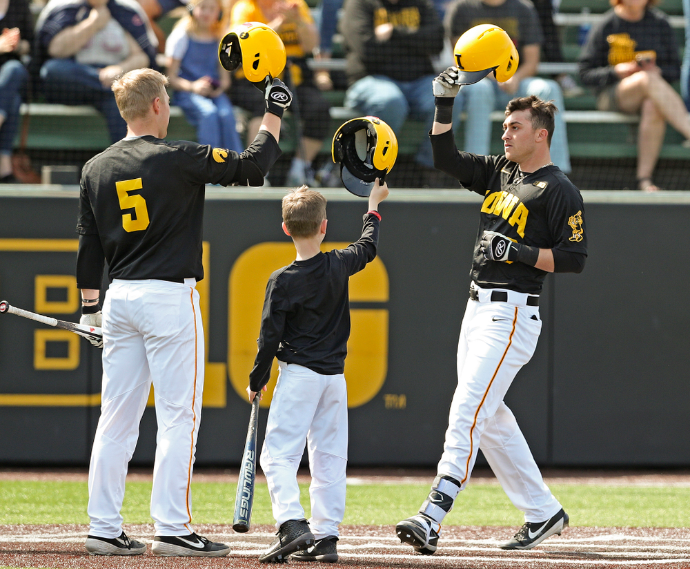 Iowa Hawkeyes shortstop Tanner Wetrich (16) celebrates after hitting a solo home run during the second inning of their game against Rutgers at Duane Banks Field in Iowa City on Saturday, Apr. 6, 2019. (Stephen Mally/hawkeyesports.com)