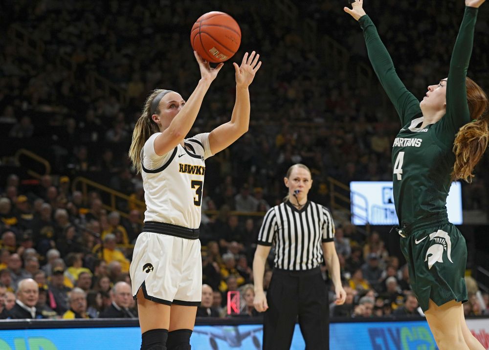 Iowa Hawkeyes guard Makenzie Meyer (3) makes a 3-pointer during the second quarter of their game at Carver-Hawkeye Arena in Iowa City on Sunday, January 26, 2020. (Stephen Mally/hawkeyesports.com)