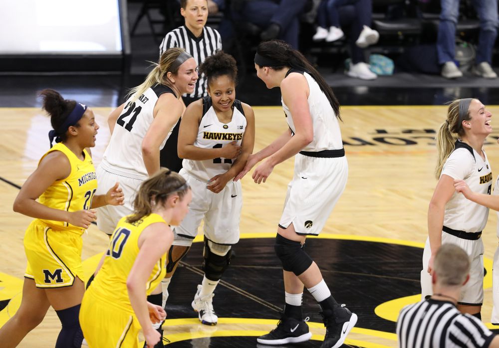 Iowa Hawkeyes forward Hannah Stewart (21), guard Tania Davis (11), and forward Megan Gustafson (10) against the Michigan Wolverines Thursday, January 17, 2019 at Carver-Hawkeye Arena. (Brian Ray/hawkeyesports.com)
