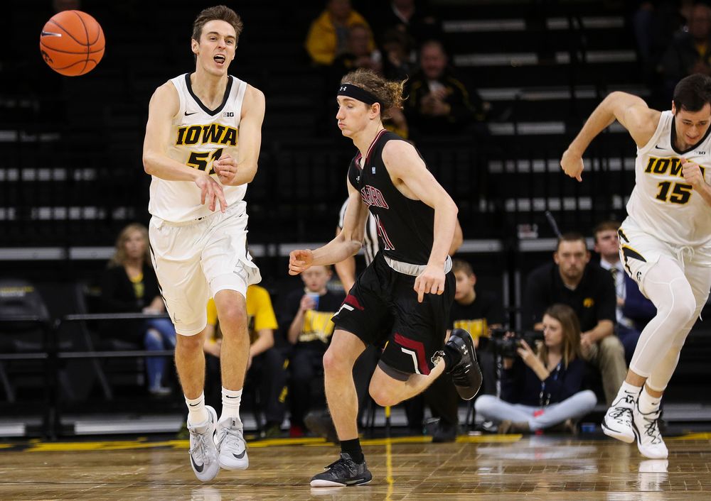 Iowa Hawkeyes forward Nicholas Baer (51) makes an outlet pass during a game against Guilford College at Carver-Hawkeye Arena on November 4, 2018. (Tork Mason/hawkeyesports.com)