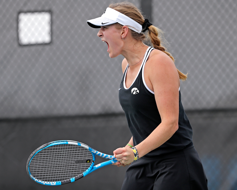 Iowa's Ashleigh Jacobs celebrates after winning her match against Rutgers at the Hawkeye Tennis and Recreation Complex in Iowa City on Friday, Apr. 5, 2019. (Stephen Mally/hawkeyesports.com)