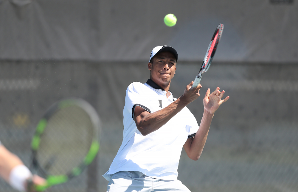 IowaÕs Oliver Okonkwo and Will Davies play a doubles match against the Michigan Wolverines Sunday, April 21, 2019 at the Hawkeye Tennis and Recreation Complex. (Brian Ray/hawkeyesports.com)