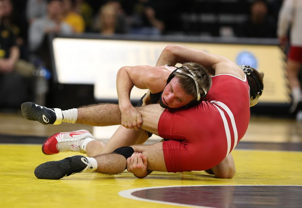 IowaÕs Max Murin wrestles WisconsinÕs Tristan Moran at 141 pounds Sunday, December 1, 2019 at Carver-Hawkeye Arena. Murin won the match 3-2. (Brian Ray/hawkeyesports.com)