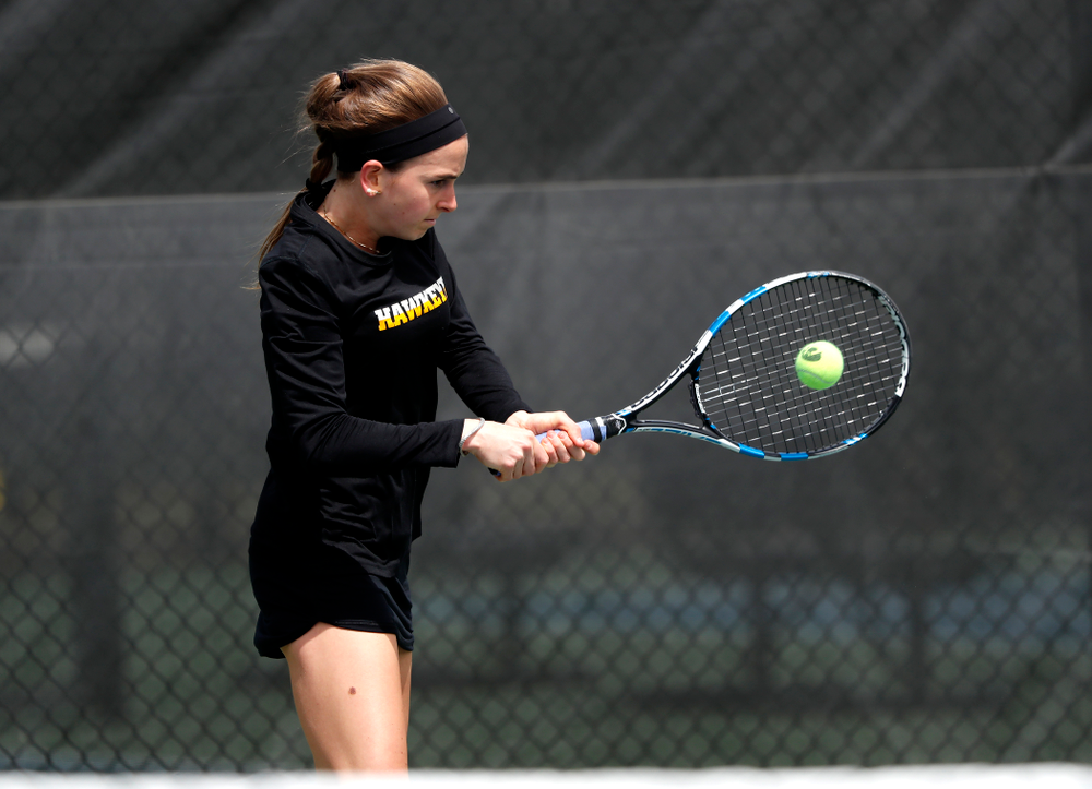 Iowa's Adrienne Jensen against the Wisconsin Badgers Sunday, April 22, 2018 at the Hawkeye Tennis and Recreation Center. (Brian Ray/hawkeyesports.com)