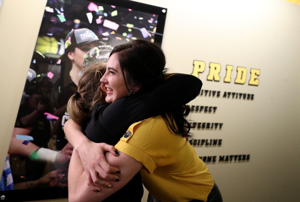 Megan Gustafson hugs Iowa Hawkeyes guard Kathleen Doyle (22) following a jersey retirement ceremony Sunday, January 26, 2020 at Carver-Hawkeye Arena. (Brian Ray/hawkeyesports.com)
