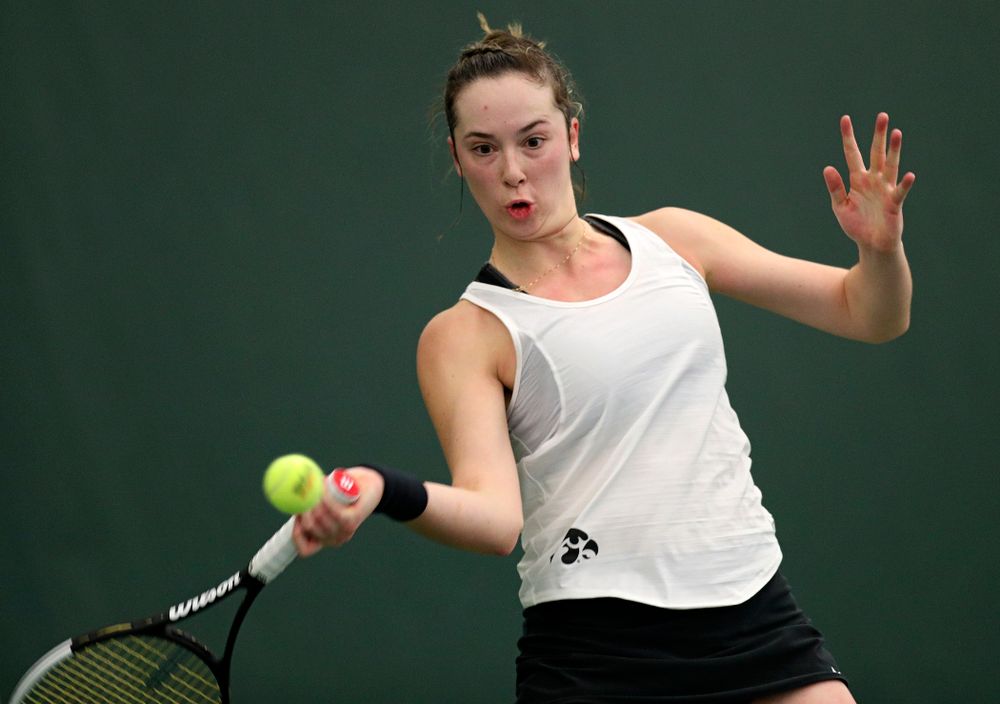 Iowa’s Samantha Mannix returns a shot during her singles match at the Hawkeye Tennis and Recreation Complex in Iowa City on Sunday, February 23, 2020. (Stephen Mally/hawkeyesports.com)