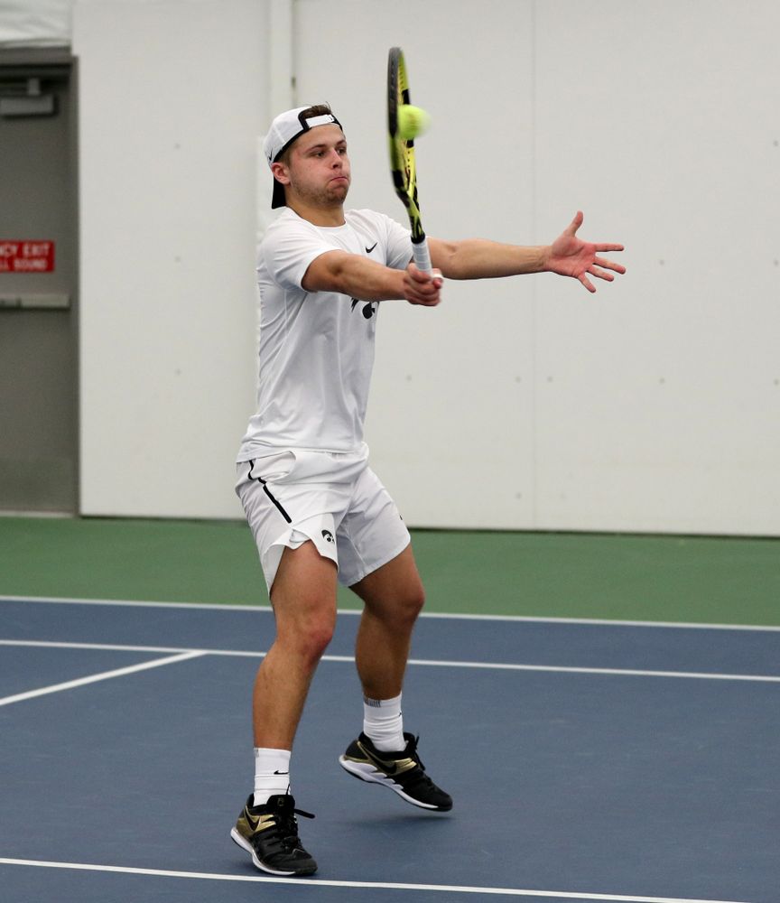 Iowa’s Will Davies against Cornell Sunday, March 8, 2020 at the Hawkeye Tennis and Recreation Center. (Brian Ray/hawkeyesports.com)