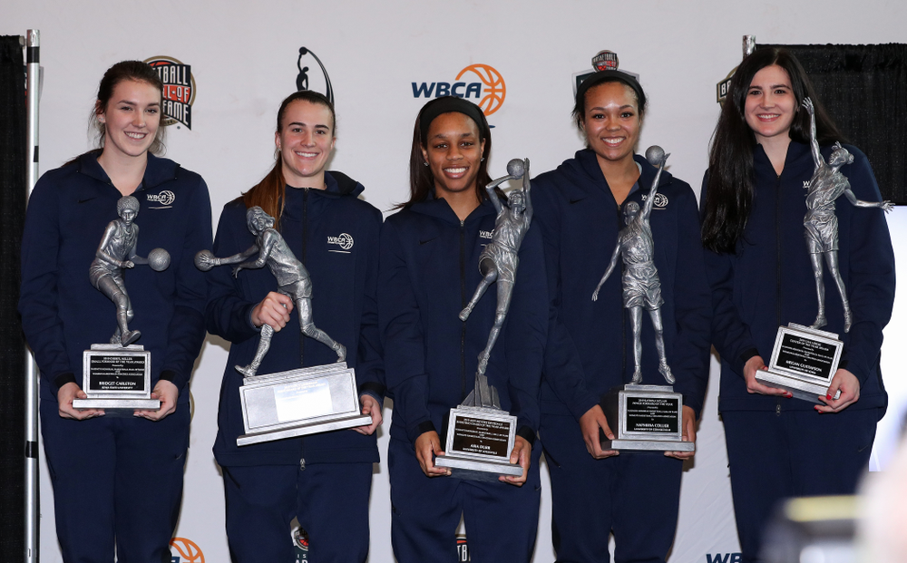 Lisa Leslie Award winner Iowa Hawkeyes forward Megan Gustafson (10) stands with the other members of the WBCA Naismith Starting 5 during a news conference Wednesday, April 4, 2018 at Amalie Arena in Tampa, FL. (Brian Ray/hawkeyesports.com)