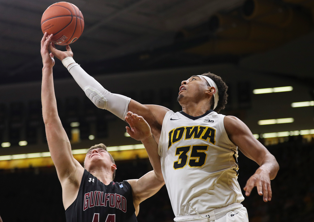 Iowa Hawkeyes forward Cordell Pemsl (35) goes up for a rebound during a game against Guilford College at Carver-Hawkeye Arena on November 4, 2018. (Tork Mason/hawkeyesports.com)