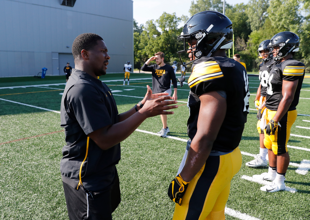 Iowa Hawkeyes running backs coach Derrick Foster and running back Mekhi Sargent (10) during camp practice No. 17 Wednesday, August 22, 2018 at the Kenyon Football Practice Facility. (Brian Ray/hawkeyesports.com)
