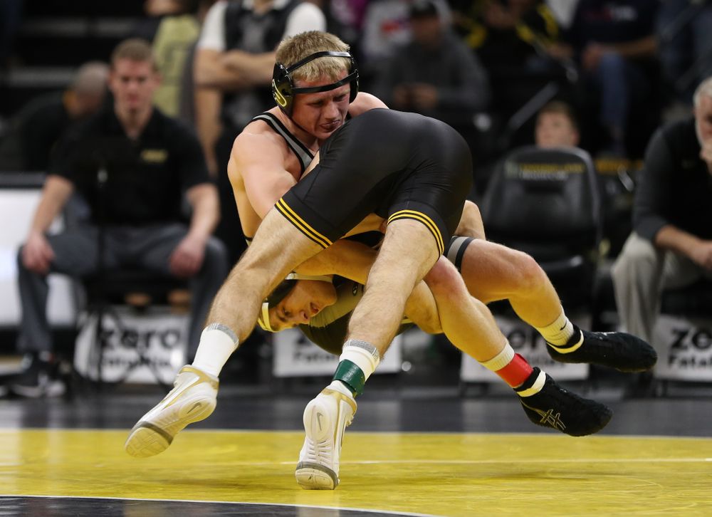 Iowa's Carter Happel wrestles Purdue's Parker Filius at 149 pounds Saturday, November 24, 2018 at Carver-Hawkeye Arena. (Brian Ray/hawkeyesports.com)